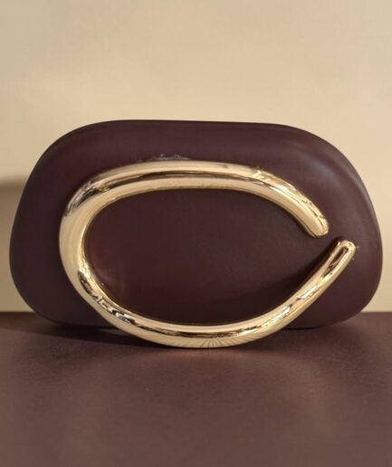CLUTCH RIGIDA BORDEAUX CON MANICO IN METALLO